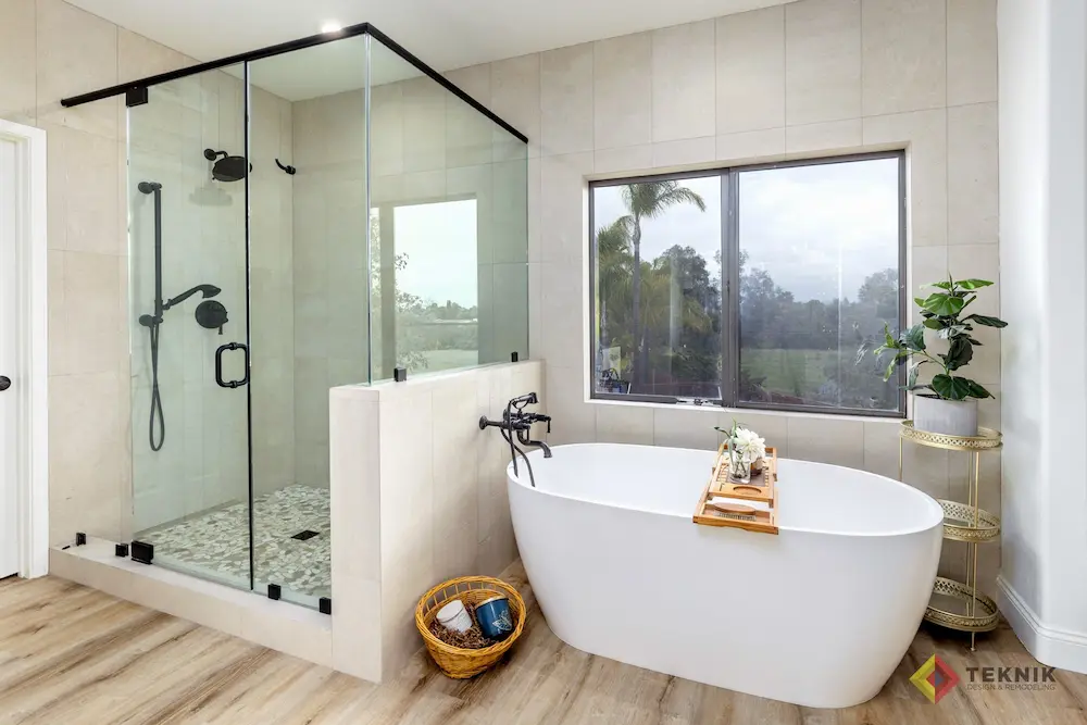 Escondido master bathroom remodel with glass shower freestanding tub and natural light