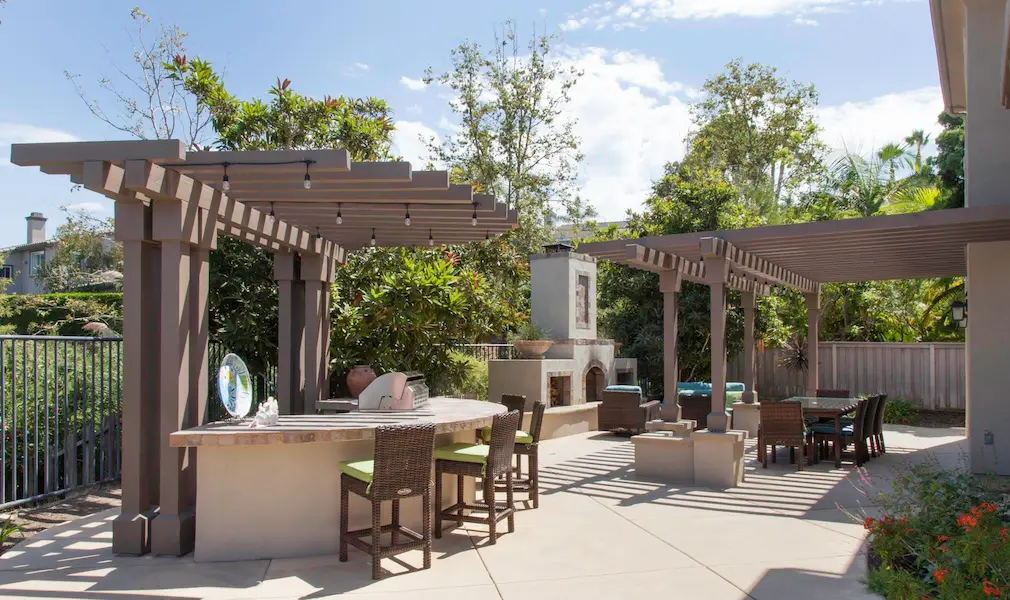 outdoor and living room renovation featuring a pergola